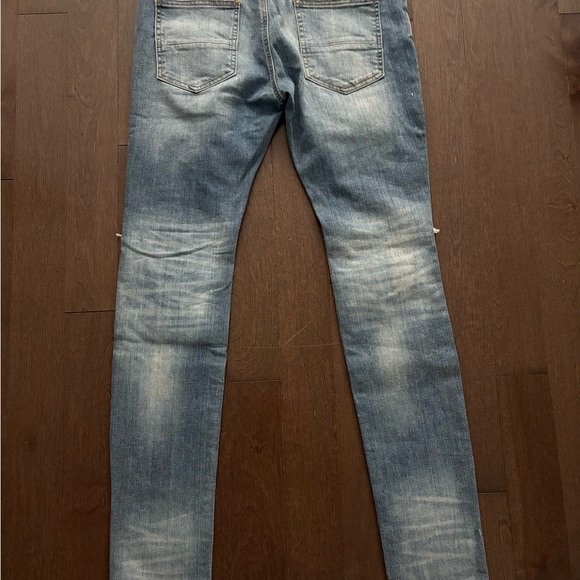 AMIRI Light Blue Distressed Skinny Jeans - Picture 5 of 7
